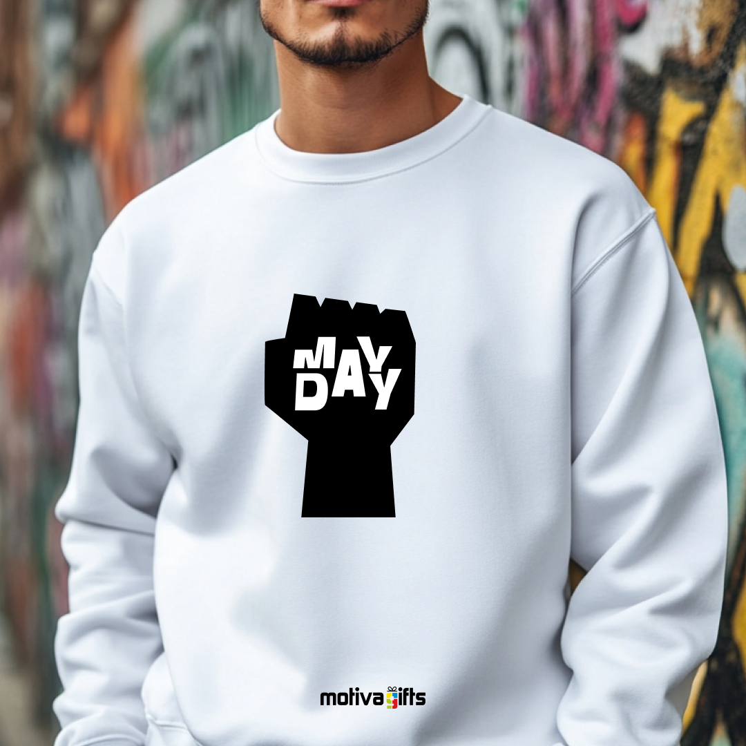 A man wearing a white sweatshirt featuring bold black typography that reads May Day