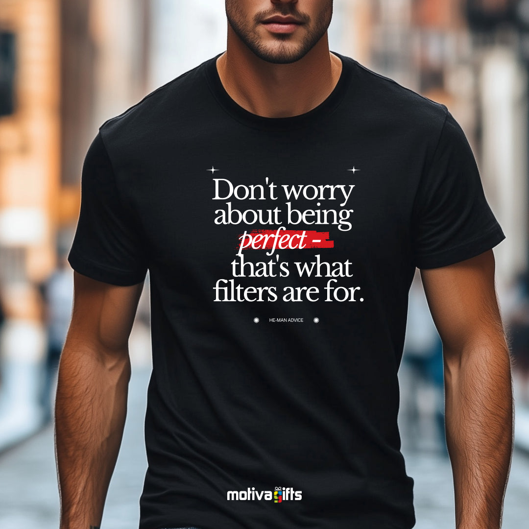 A man wearing a black T-shirt featuring bold white typography that reads Don’t worry about being perfect - that's what filters are for