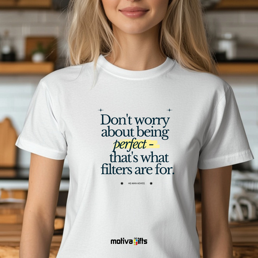 A woman wearing a white T-shirt featuring bold black typography that reads Don’t worry about being perfect - that's what filters are for