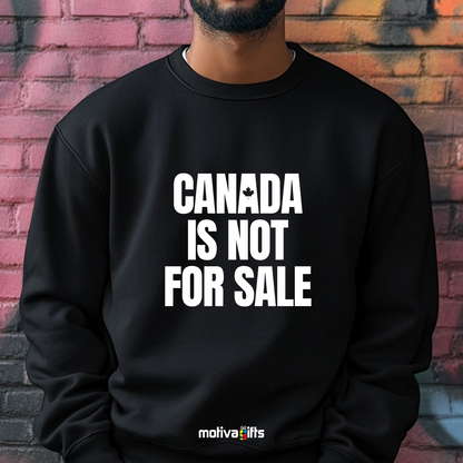 A man wearing a black crewneck sweatshirt featuring bold white typography that reads Canada is Not for Sale