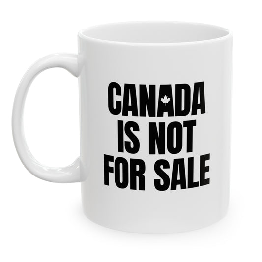 Left view white ceramic 11 oz mug that reads in black bold Canada is Not For Sale