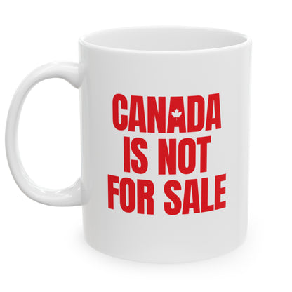 Left view white ceramic 11 oz mug that reads in Red bold Canada is Not For Sale