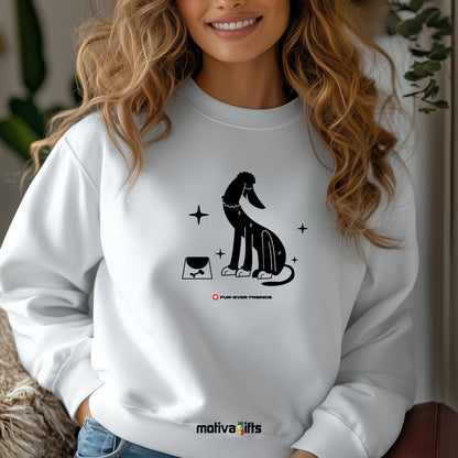 A woman wearing a Charm Dog white Sweatshirt that showcases a unique, fun dog illustration