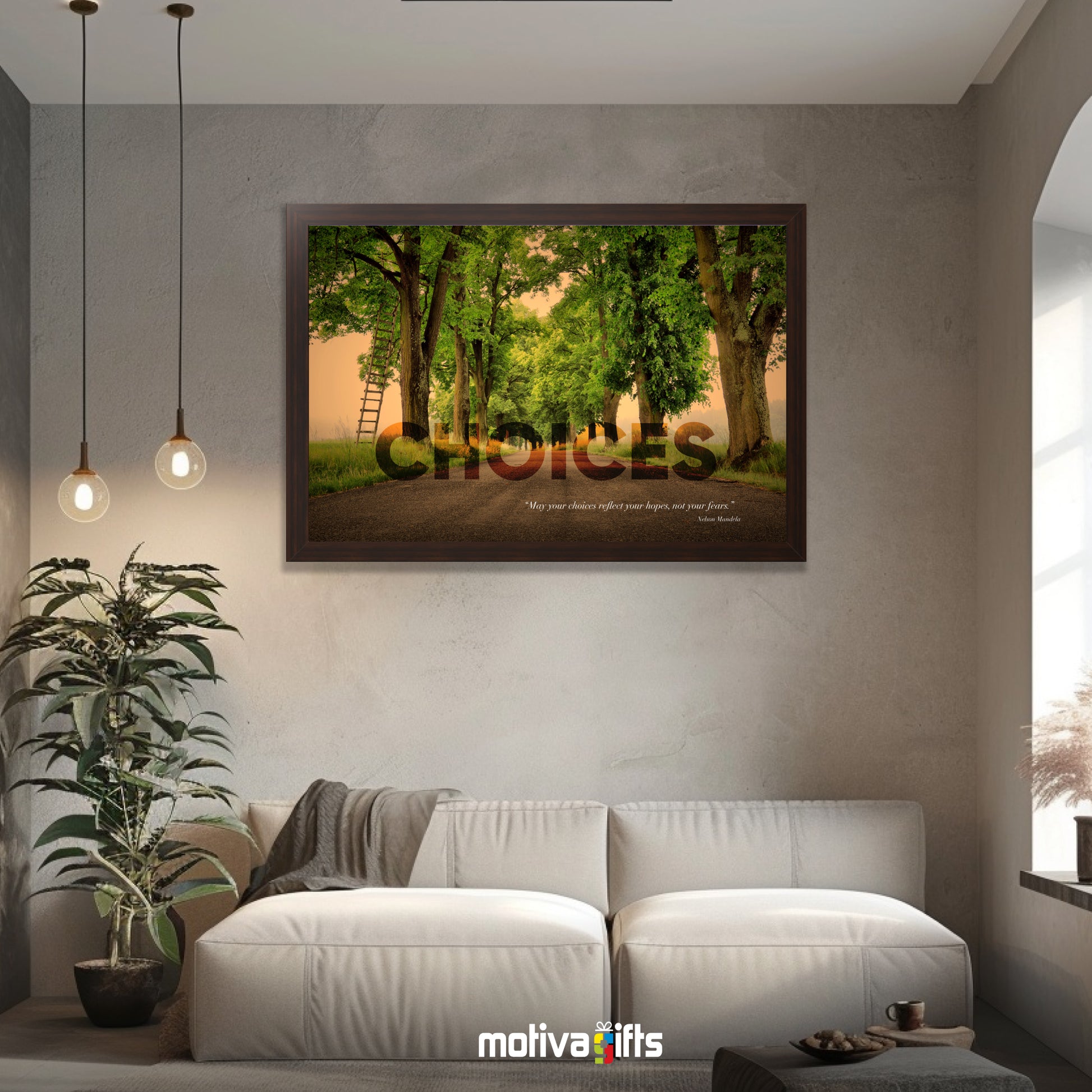 A walnut framed art wall with the word CHOICES in large text and Nelson Mandela quote hangs in a modern living room. 