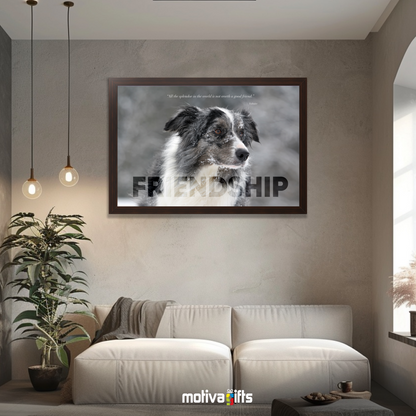 A walnut framed art wall with the word FRIENDSHIP in large text and a Voltaire quote hangs in a modern living room. 