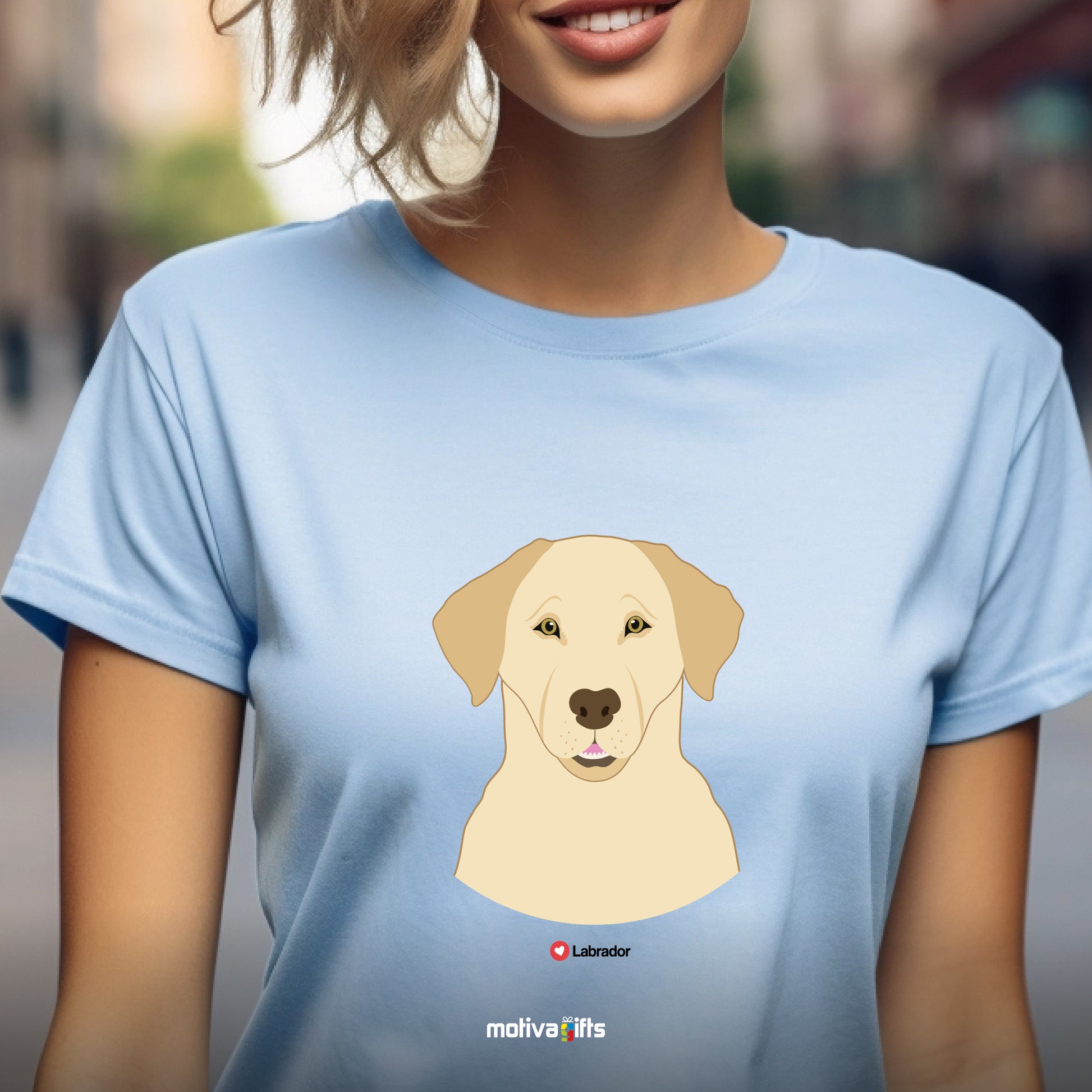 Woman wearing light blue tshirt with Labrador design on the front, front view, by Motiva Gifts.