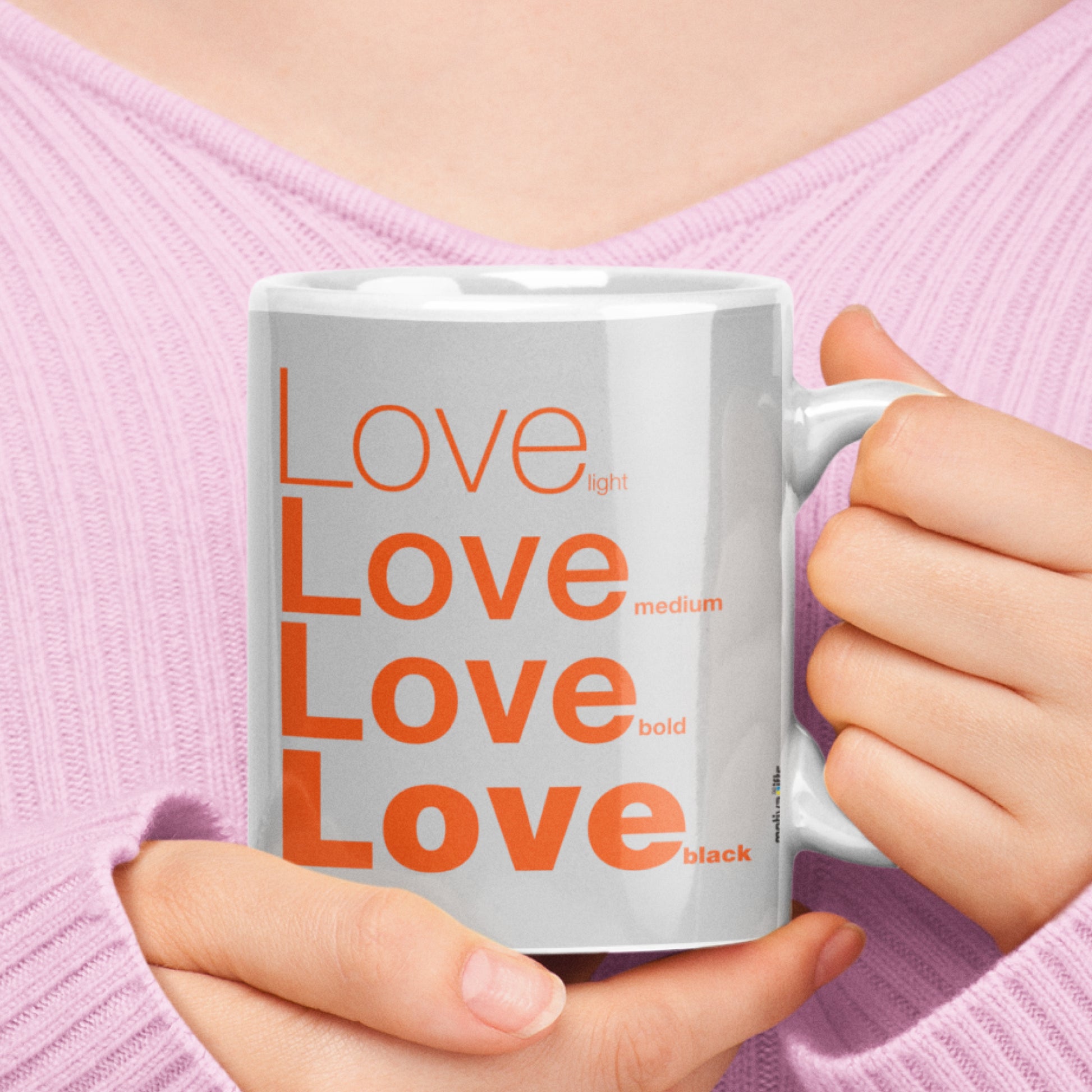 Woman holding a Love Grey Ceramic Mug