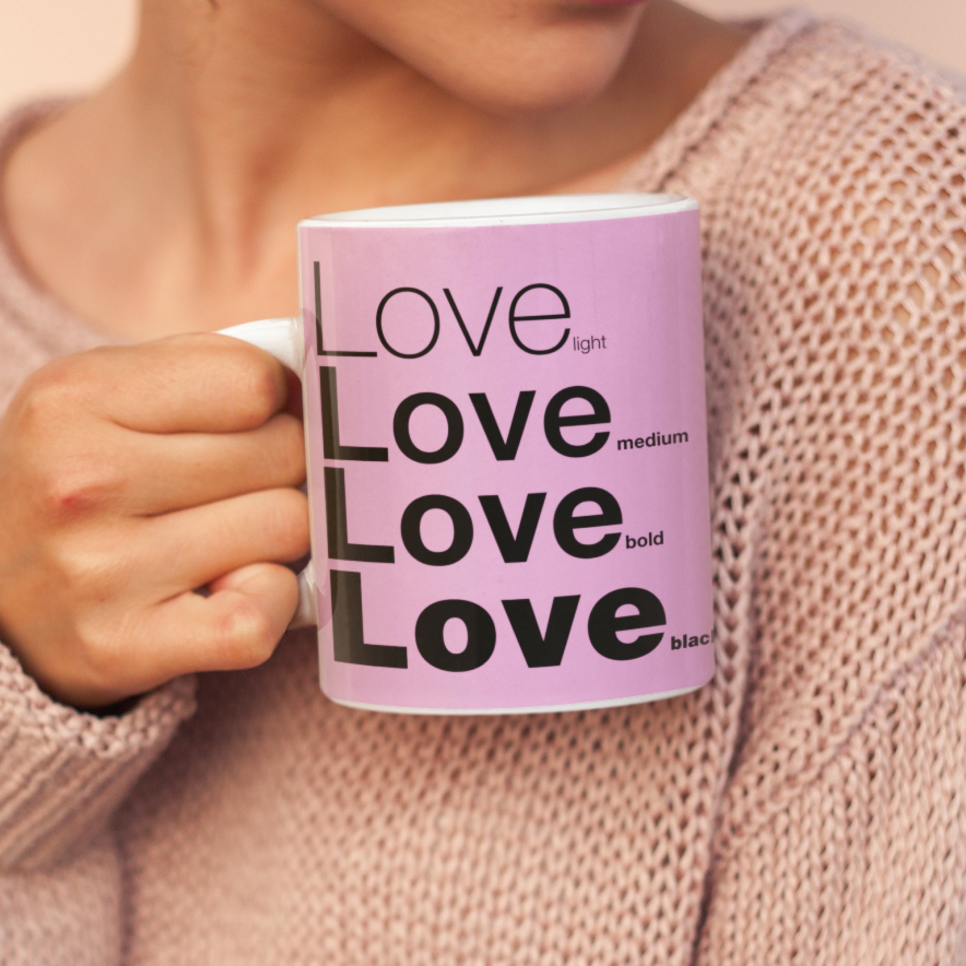 Woman holding a Love Pink Ceramic Mug