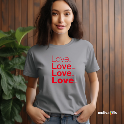 Woman using Sport Gray unisex t-shirt with Love printed in red on the front in four lines with different font weights (light, medium, bold, black). Made of cotton and polyester, short sleeves, crew neck. By Motiva Gifts.