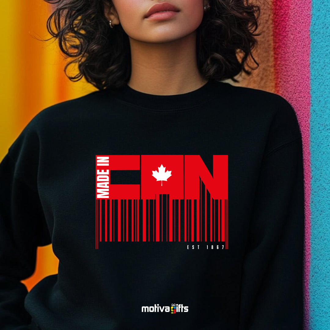 A woman wearing a black sweatshirt featuring bold white and read typography that reads Made in CAN/ Est 1867