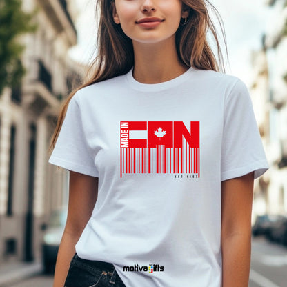 A woman wearing a white T-shirt featuring bold white and red typography that reads Made in CAN