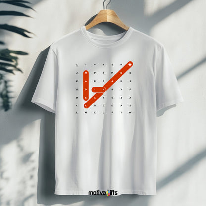 A hanging white T-shirt featuring bold white and red typography that reads Made in Canada Crossword