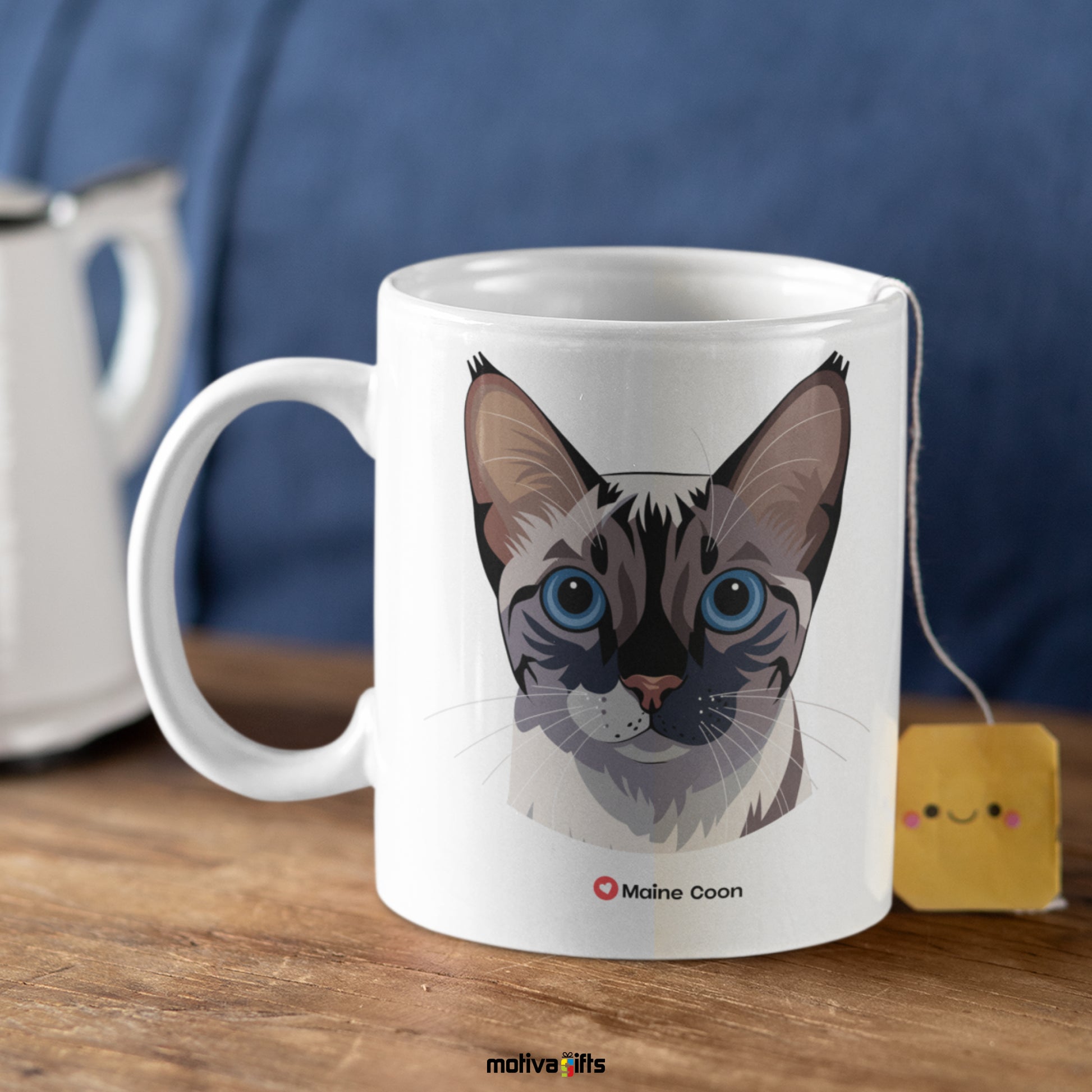 Maine Coon Love Cat White 11 oz Ceramic Mug with a tea bag inside. 