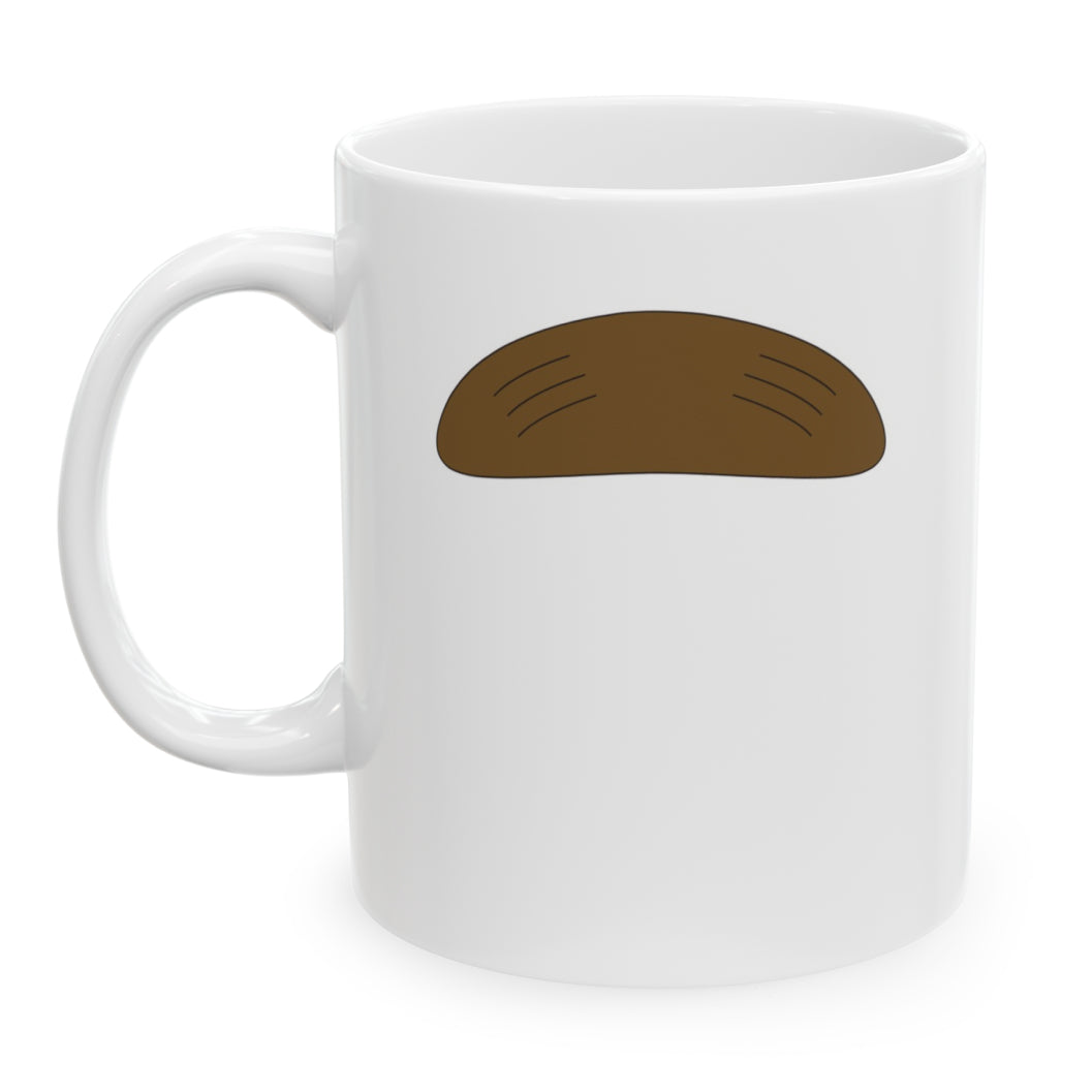 Photo of a white ceramic mug with a drawing of Ned Flander’s mustache, set against a plain white background.