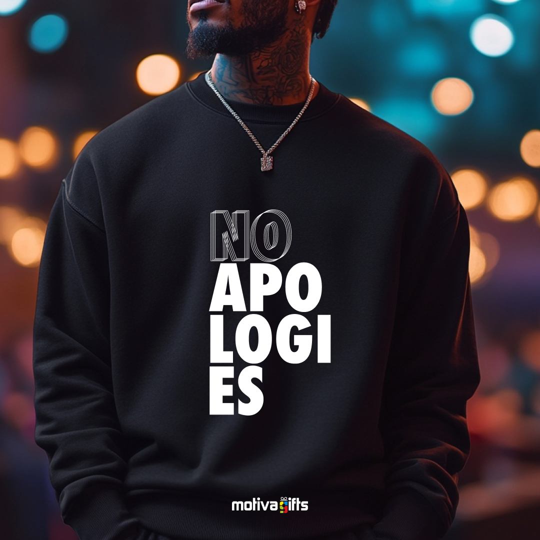 A man wearing a black crewneck sweatshirt featuring bold white typography that reads No Apologies