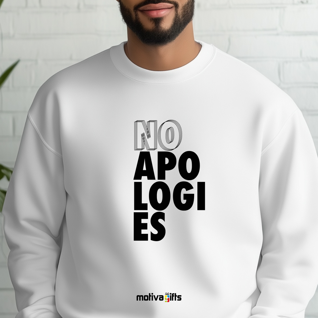 A man wearing a white crewneck sweatshirt featuring bold black typography that reads No Apologies