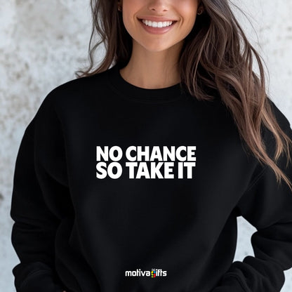A woman wearing a black flat-lay Sweatshirt with white typography that reads No Chance So Take It