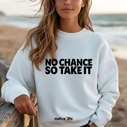 A woman wearing a white flat-lay Sweatshirt with black typography that reads No Chance So Take It