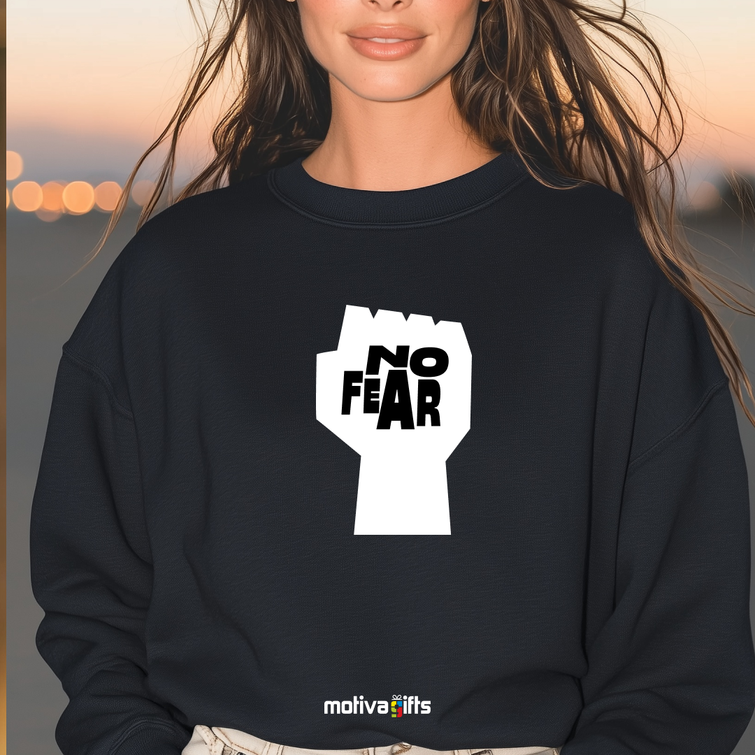 A woman wearing a black sweatshirt featuring bold white typography that reads No Fear 