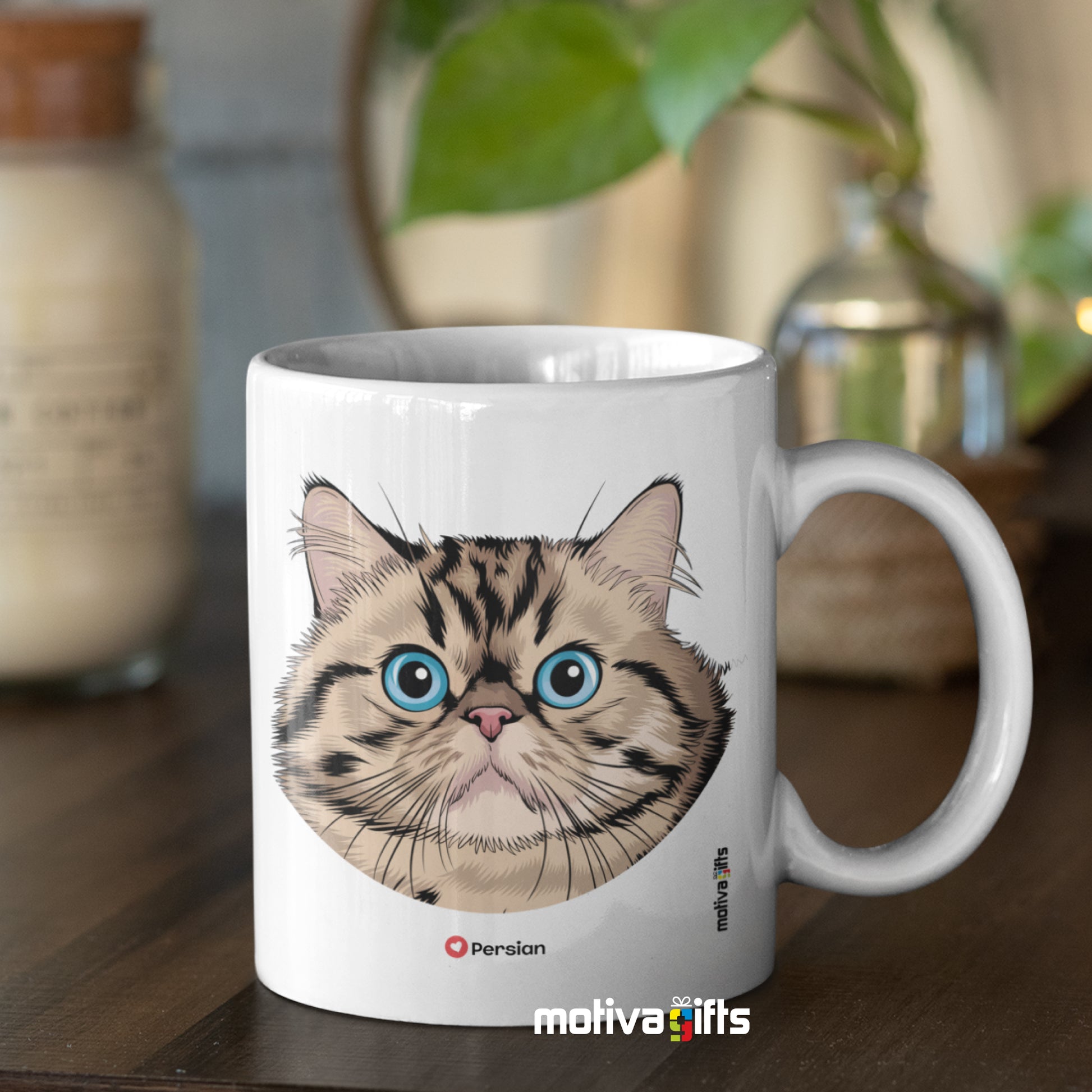 Persian Love Cat White 11 oz Ceramic Mug next to some home decorations. 