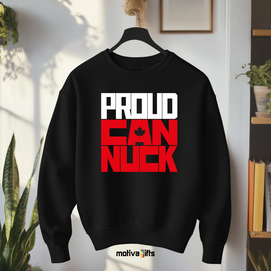 A hanging black sweatshirt featuring bold white and red typography that reads Proud Canuck