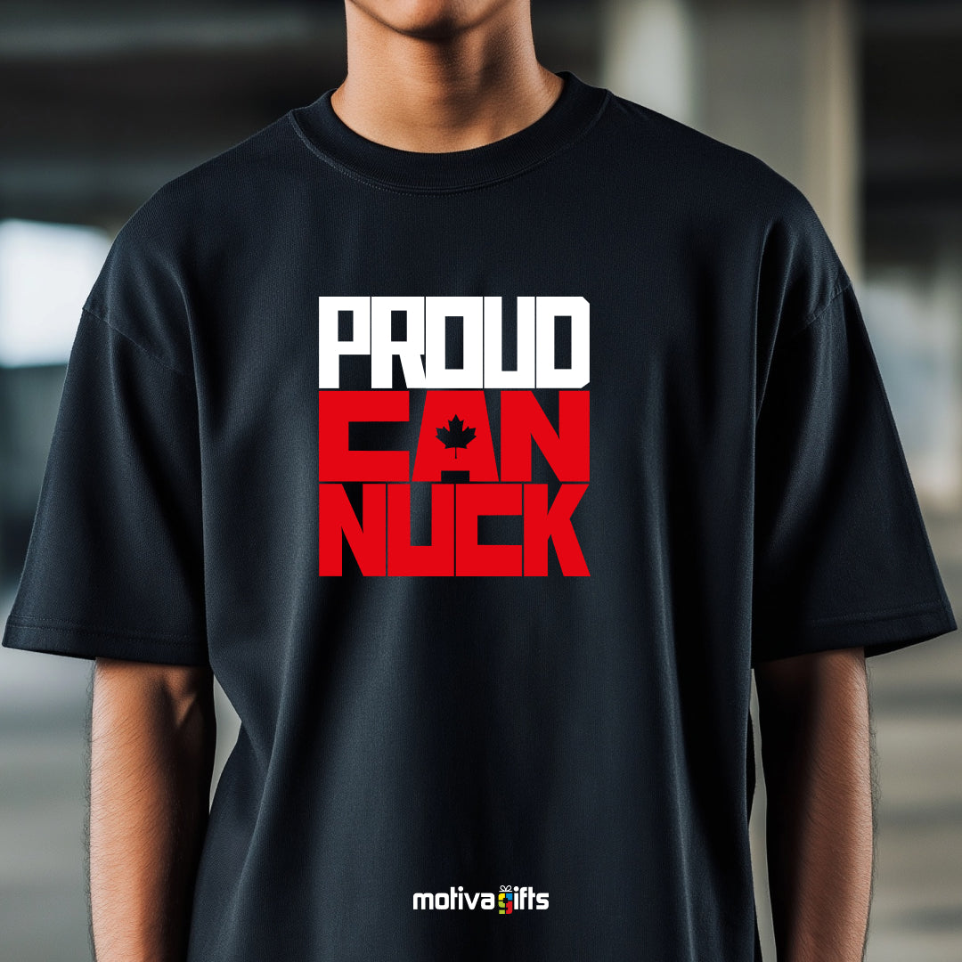 A man wearing a black T-shirt featuring bold white and red typography that reads Proud Canuck