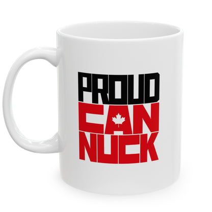 Left view white ceramic 11 oz mug that reads in black/red bold Proud Canuck 