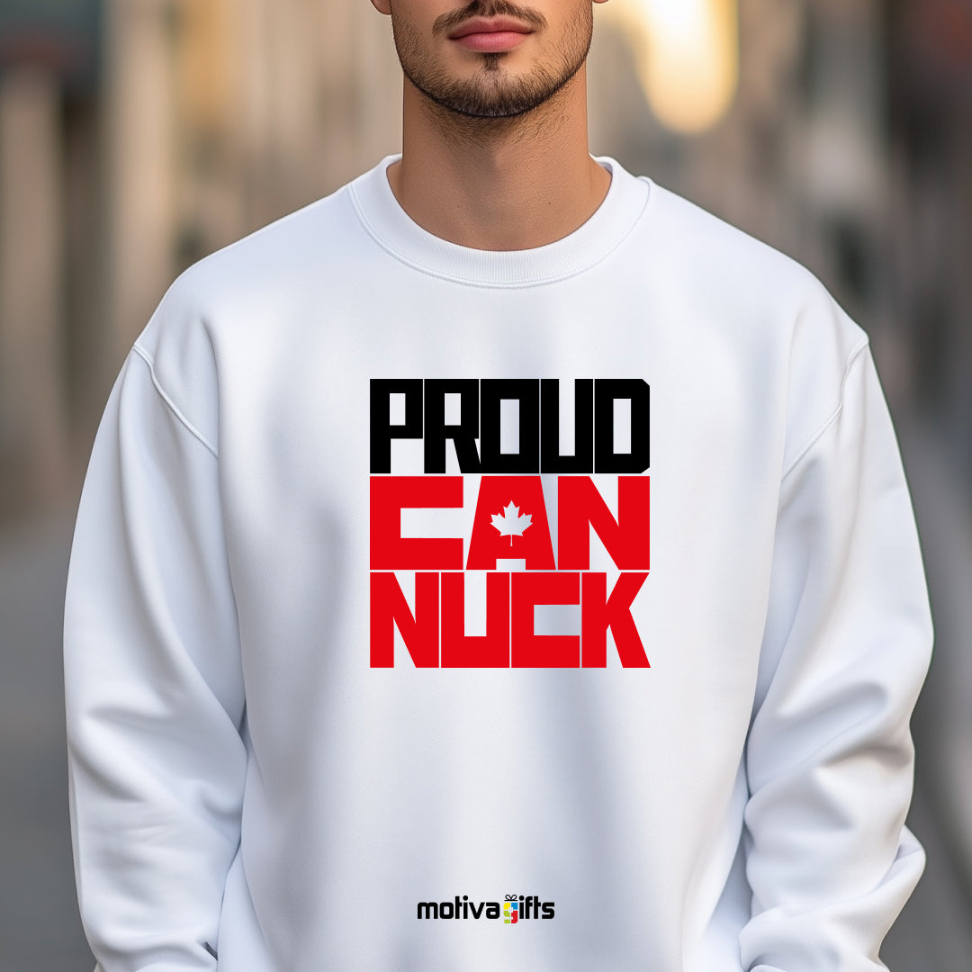 A man wearing a white sweatshirt featuring bold black and red typography that reads Proud Canuck