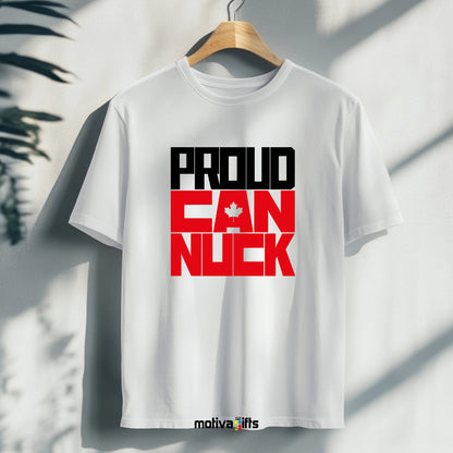 A hanging white T-shirt featuring bold white and red typography that reads Proud Canuck