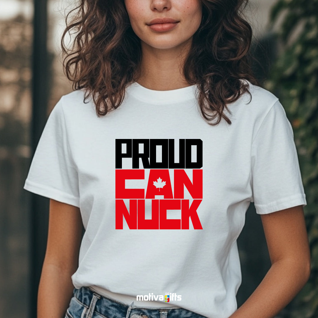 A woman wearing a white T-shirt featuring bold white and red typography that reads Proud Canuck