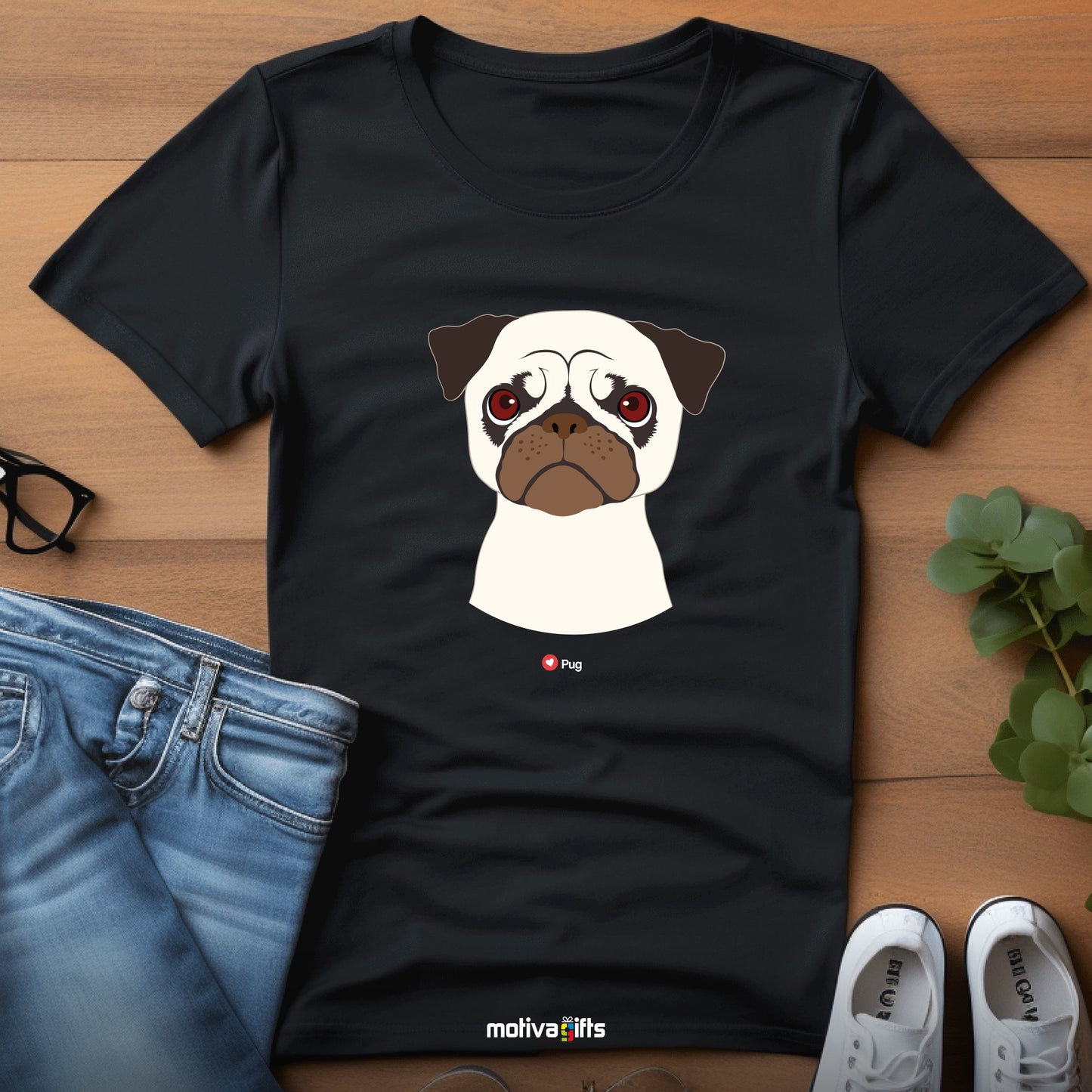 Flatlay, black tshirt with Pug design on the front, front view, by Motiva Gifts.