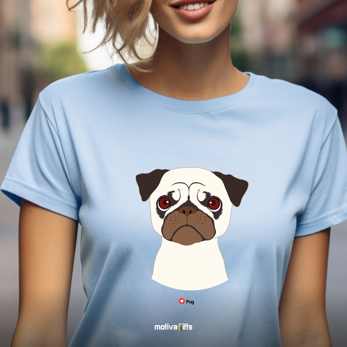 Woman wearing light blue tshirt with Pug design on the front, front view, by Motiva Gifts.