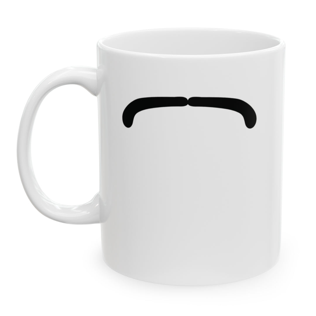 Photo of a white ceramic mug with a drawing of Ringo Starr mustache, set against a plain white background.