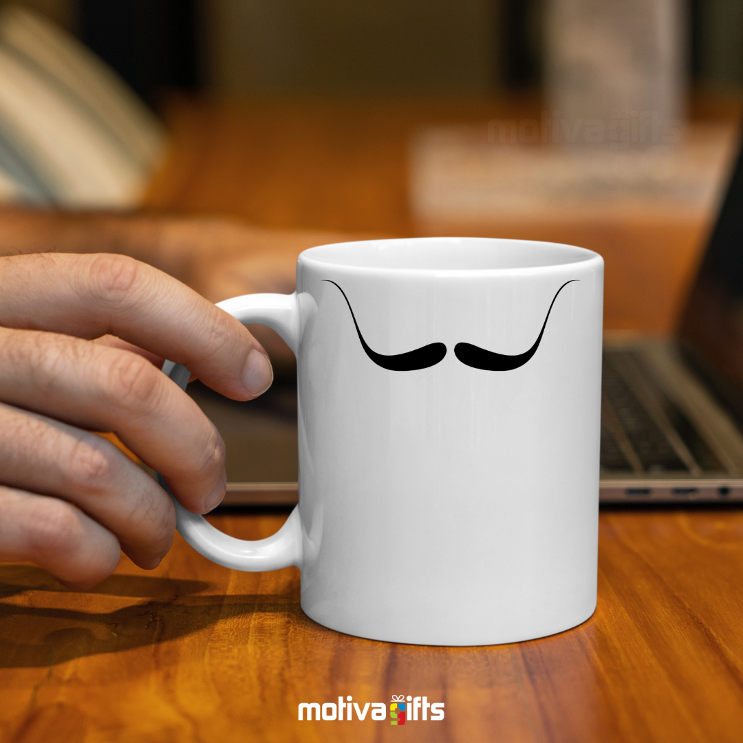 Man holding a white coffee mug 11 oz mug white with black mustache design inspired by Salvador Dali By Motiva Gifts 