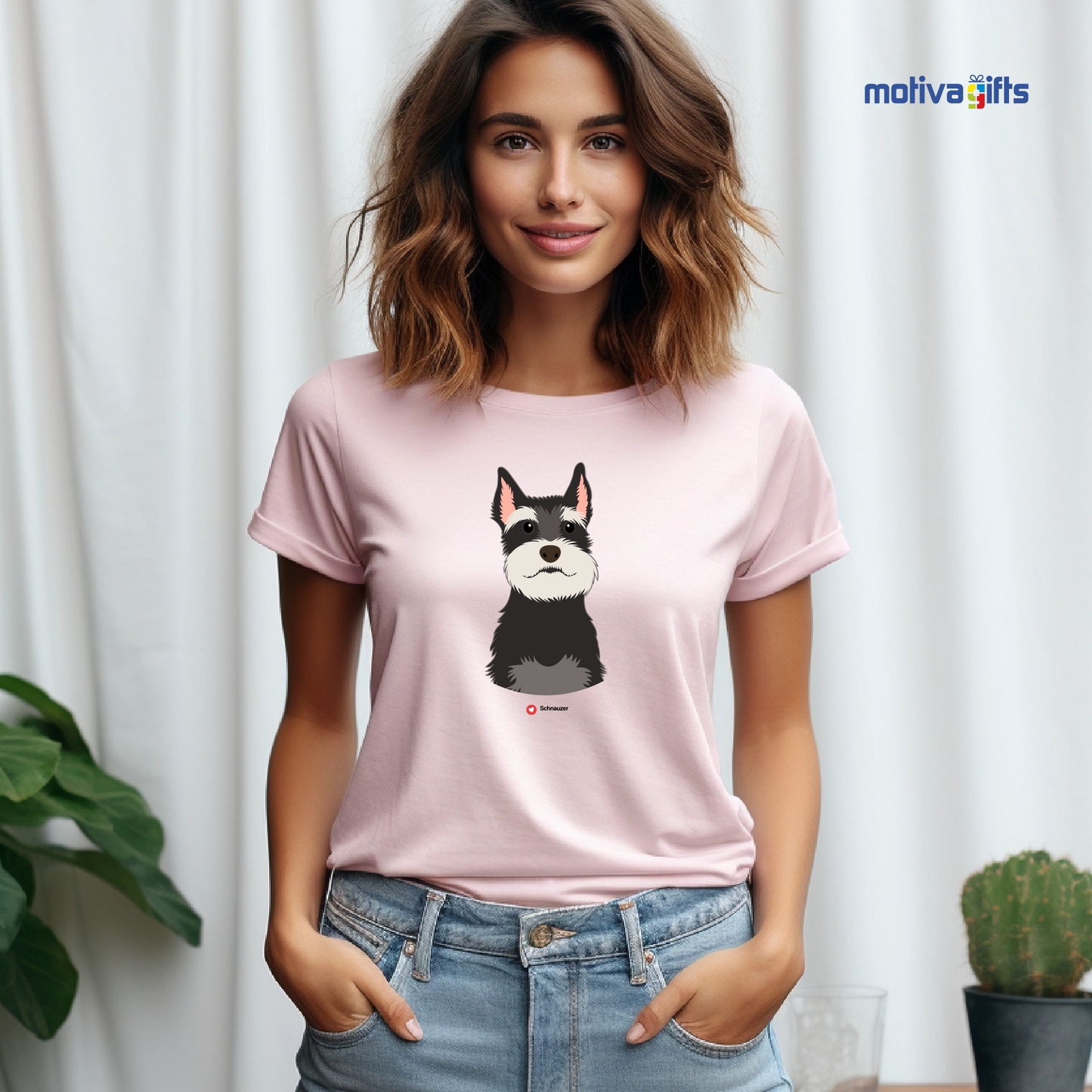 Woman wearing light pink tshirt with Schnauzer design on the front, front view, by Motiva Gifts.