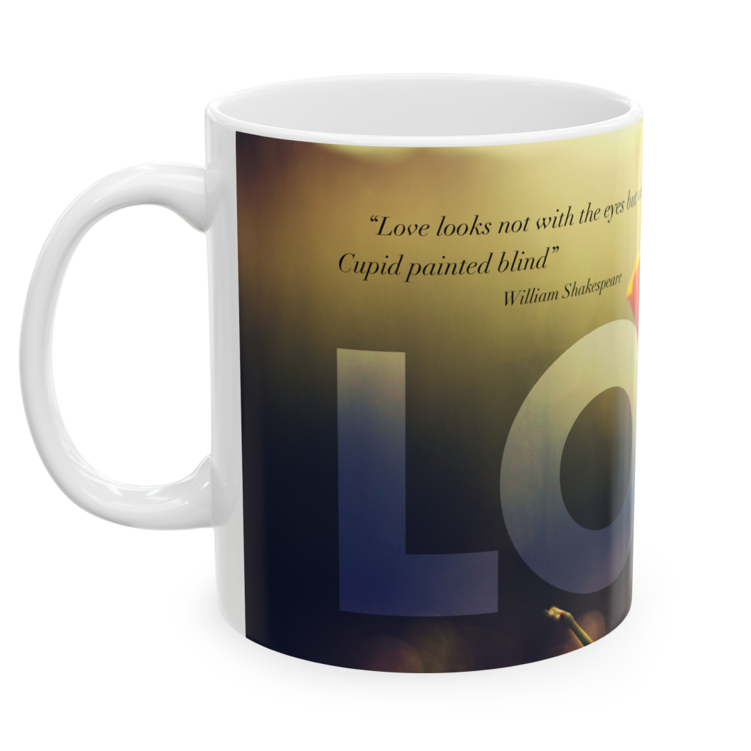 Left view of a white ceramic mug with a wraparound design featuring a landscape, displaying the word ‘Love’ top a quote by William Shakespeare: ‘Love looks not with the eyes but with the mind, and therefore is winged Cupid painted blind’, set against a plain white background.