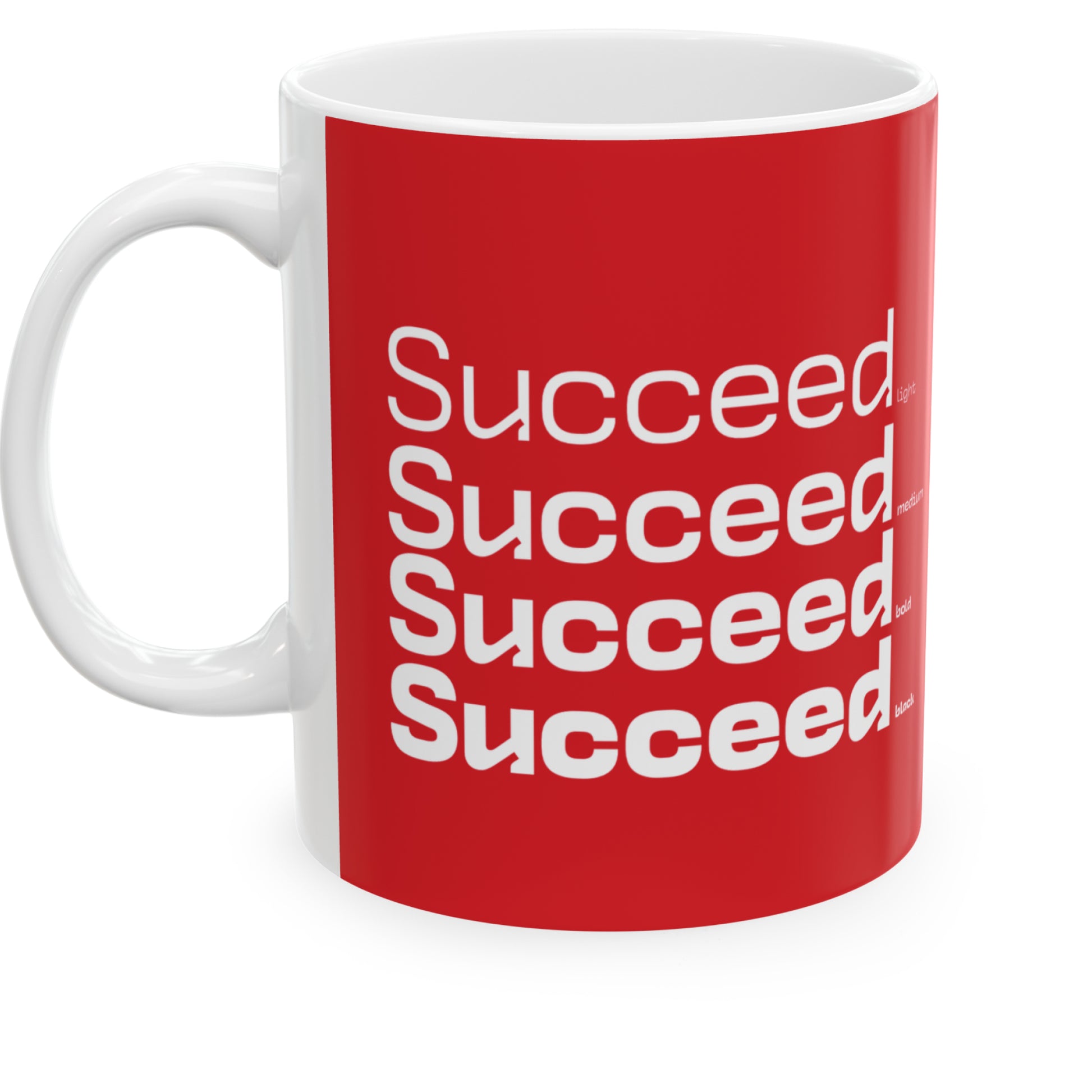 White ceramic mug with a red wraparound design and the word 'Succeed' printed in white in four typography styles: light, medium, bold, and black. Clean white background