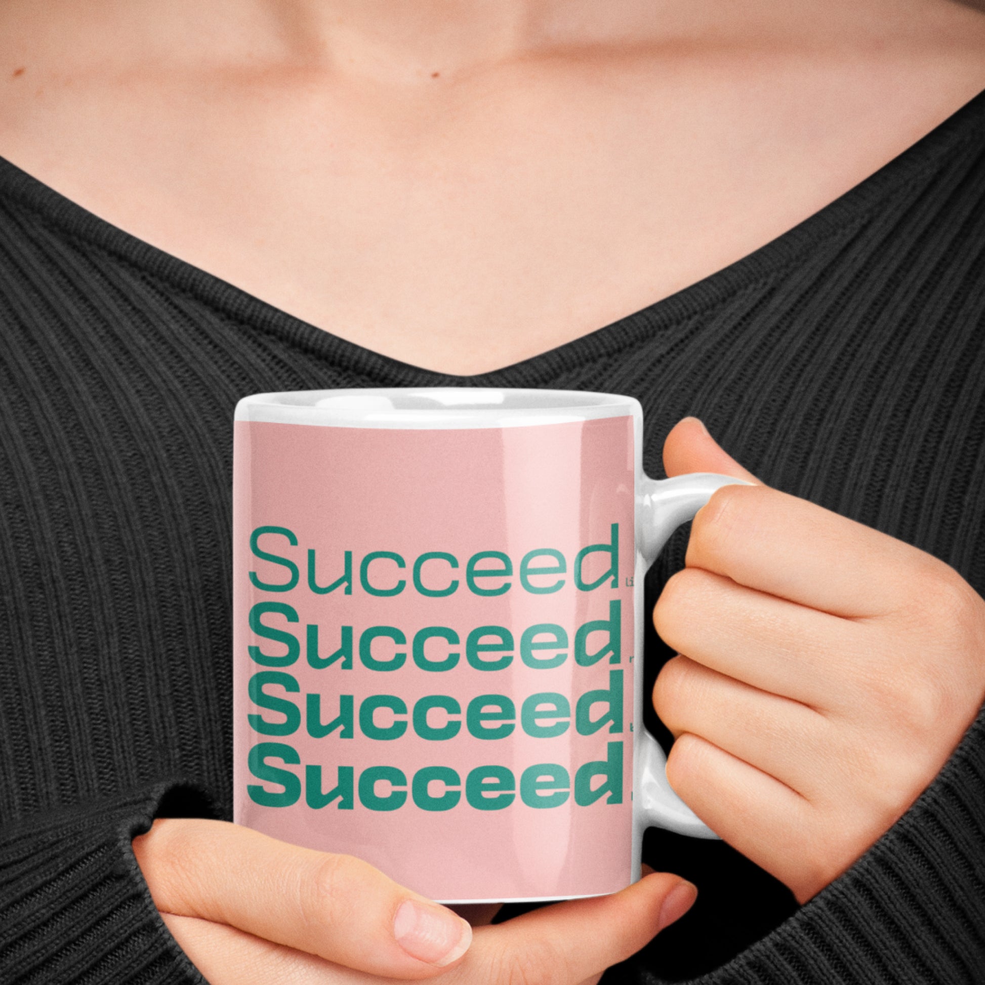 Woman holding a 'Succeed' wraparound 11 oz Ceramic Mug from Motivate Words Collection, perfect for coffee lovers and dreamers