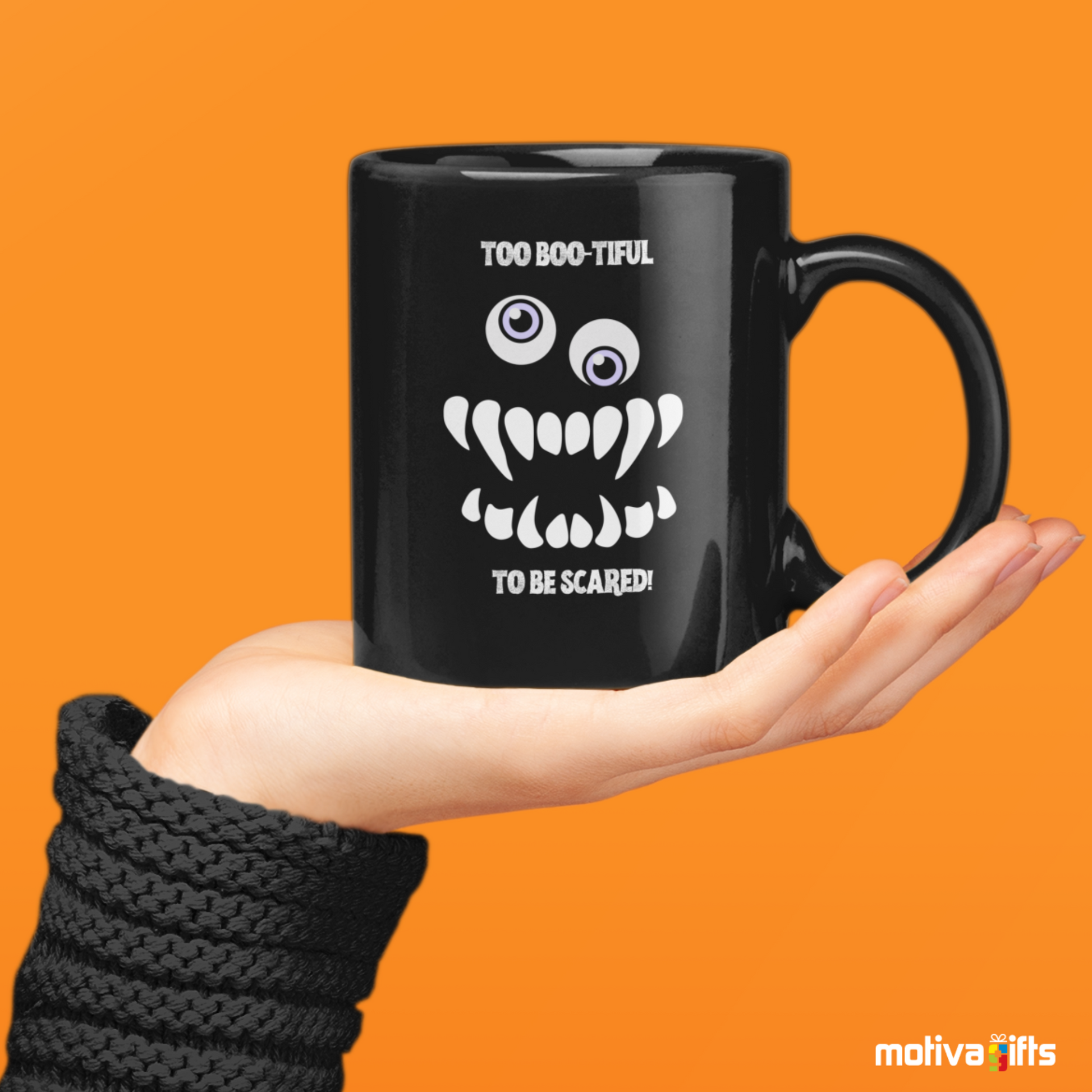 Woman holding a Too Boo-tiful to Be Scared Mug,Black,11 oz, Motiva Gifts