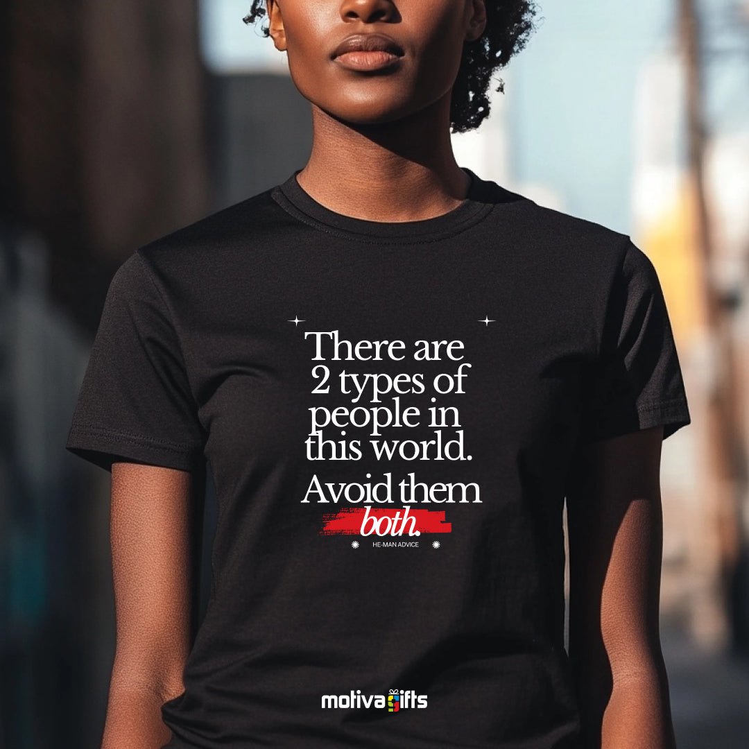 A woman wearing a black T-shirt featuring bold white typography that reads There are two types of people in this world. Avoid them both. 