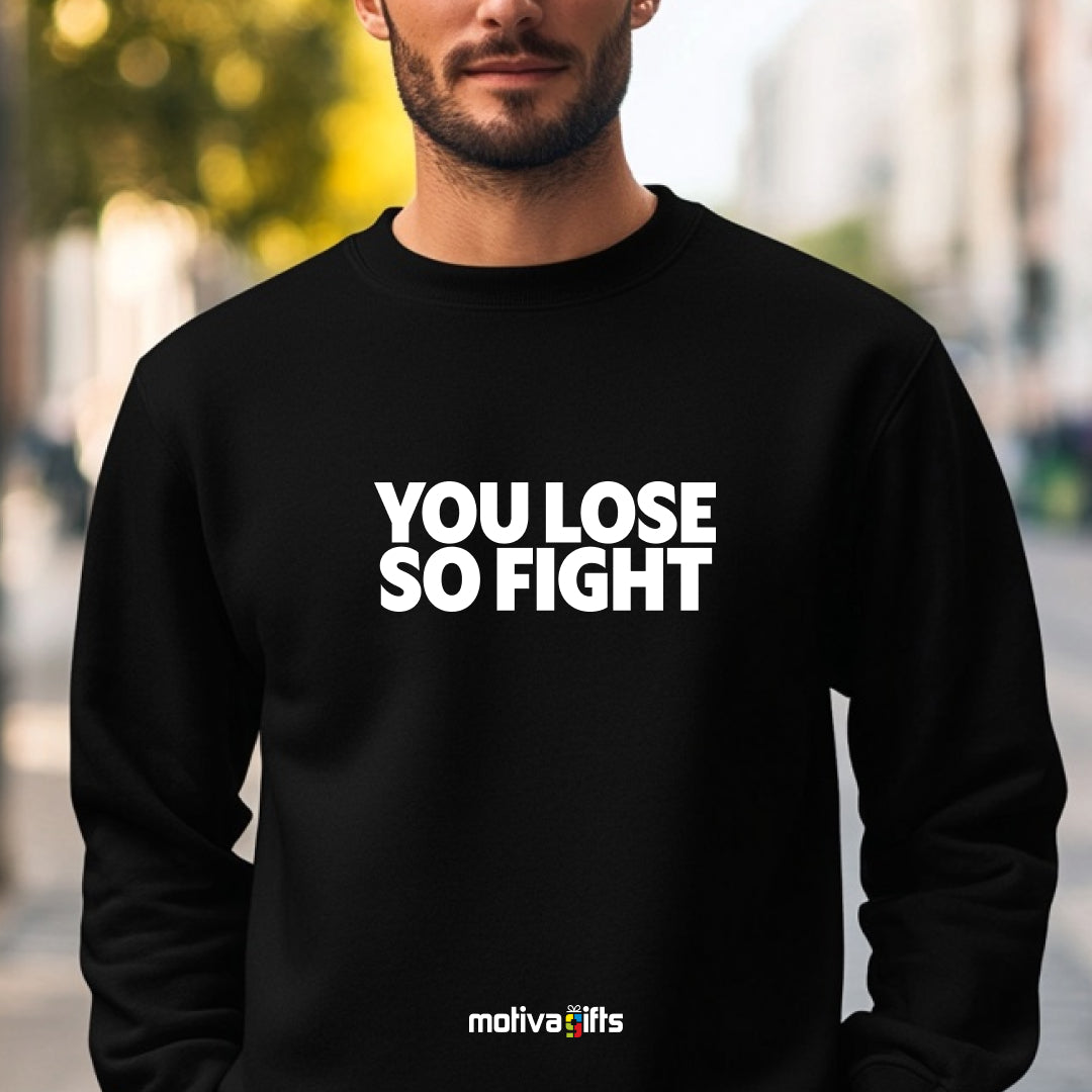 A man wearing a black flat-lay Sweatshirt with white typography that reads You Lose So Fight