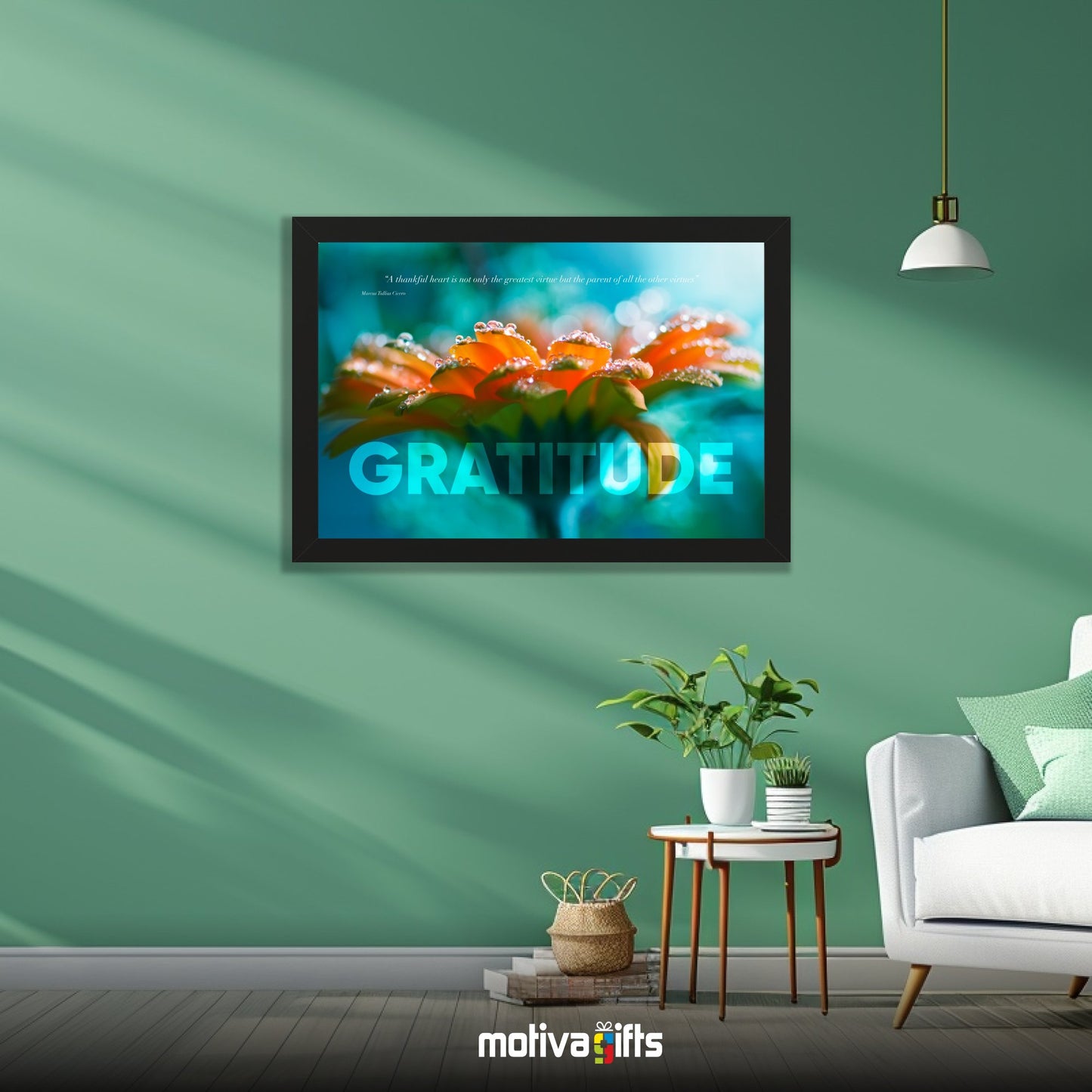 A black framed art wall with the word GRATITUDE in large text and a Cicero quote hangs in a modern living room.